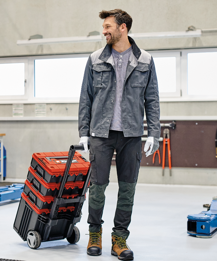 A man uses the Einhell system carrying case